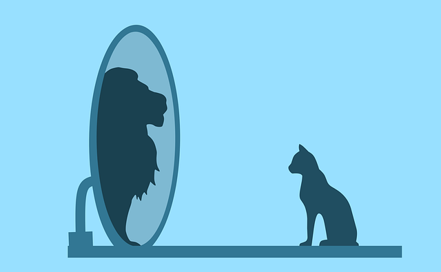 An illustration of a cat seeing himself as a lion in the mirror