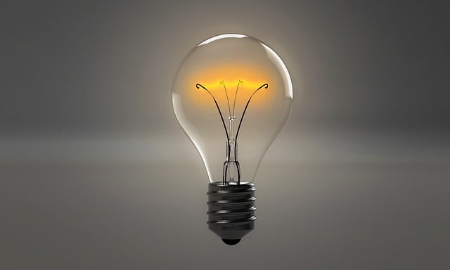 A lightbulb illustration in a grey background