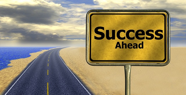 An illustration of a success sign aside a road