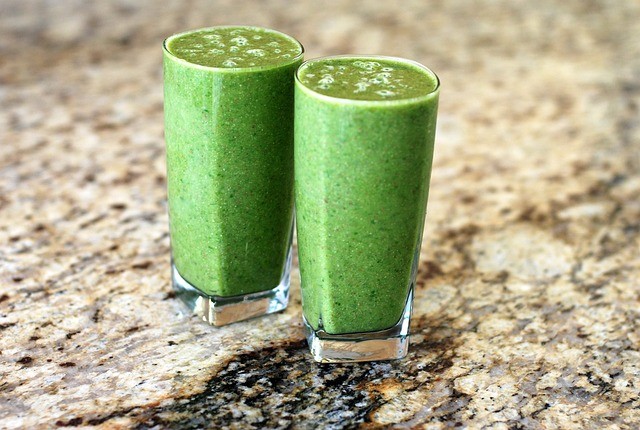 Two green smoothies side by side